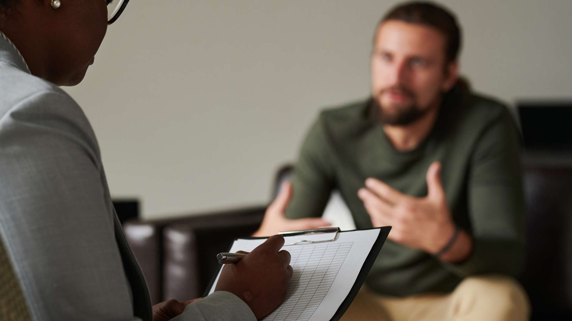 What is Addiction Treatment at Virtue At The Pointe Oregon Psychotherapy Appointment With Man